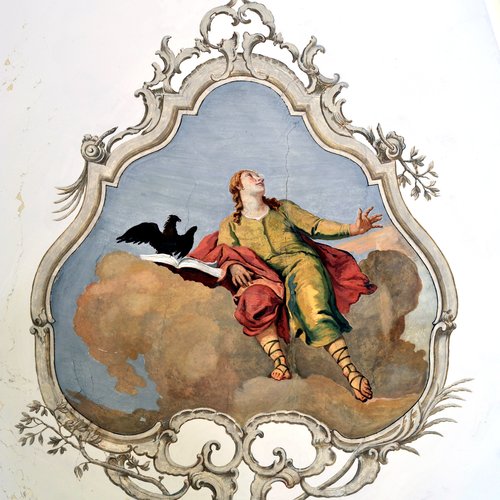L'evangelista Giovanni, affresco di Antonio Schiavi sui pennacchi del soffitto della navata, 1775