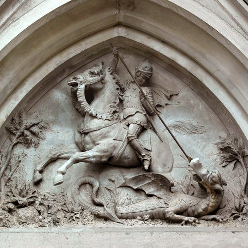 Chiesa parrocchiale di San Giorgio, facciata,  San Giorgio che uccide il drago, lunetta del portale, 1885, San Giorgio della Richinvelda