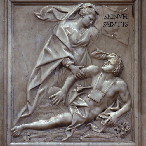 Chiesa della Beata Vergine del Carmine, Altar maggiore, paliotto, scena di sinistra, una donna si piega verso un derelitto