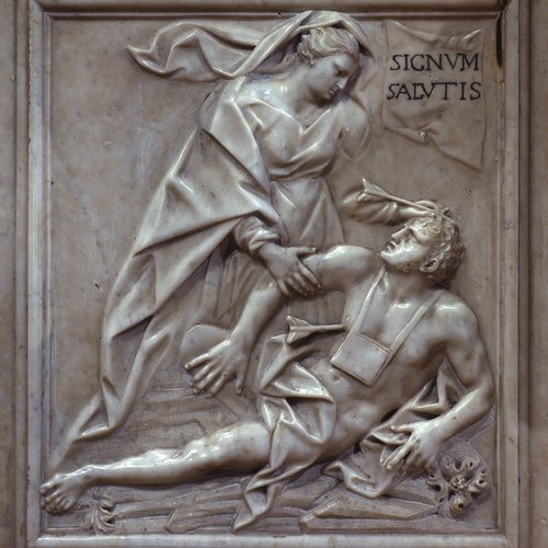 Chiesa della Beata Vergine del Carmine, Altar maggiore, paliotto, scena di sinistra, una donna si piega verso un derelitto